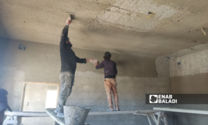 Construction workers at a house in Daraa’s western countryside - October 25, 2023 (Enab Baladi/Halim Muhammad)