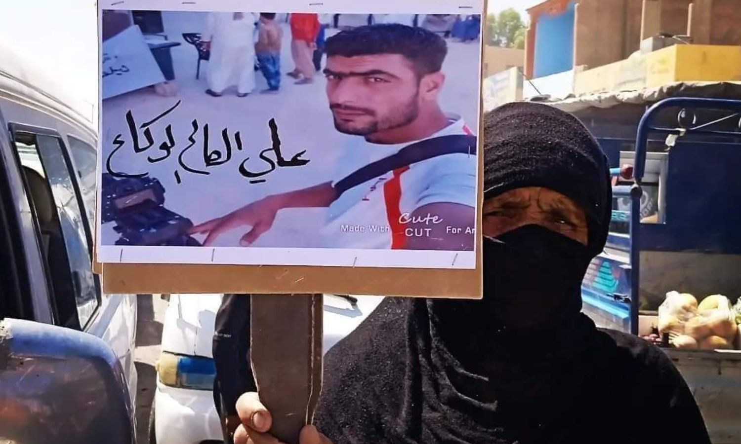 The mother of journalist Ali Saleh al-Wakaa during a demonstration in the Shuaitat area demanding the release of her son detained by the US-led International Coalition - 2021 (Facebook)