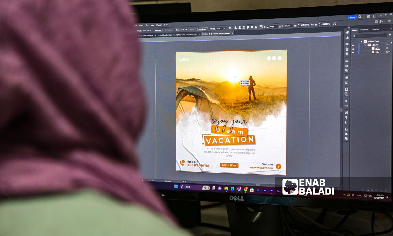 A graphic designer working on designing a commercial advertisement - October 21, 2023 (Enab Baladi)