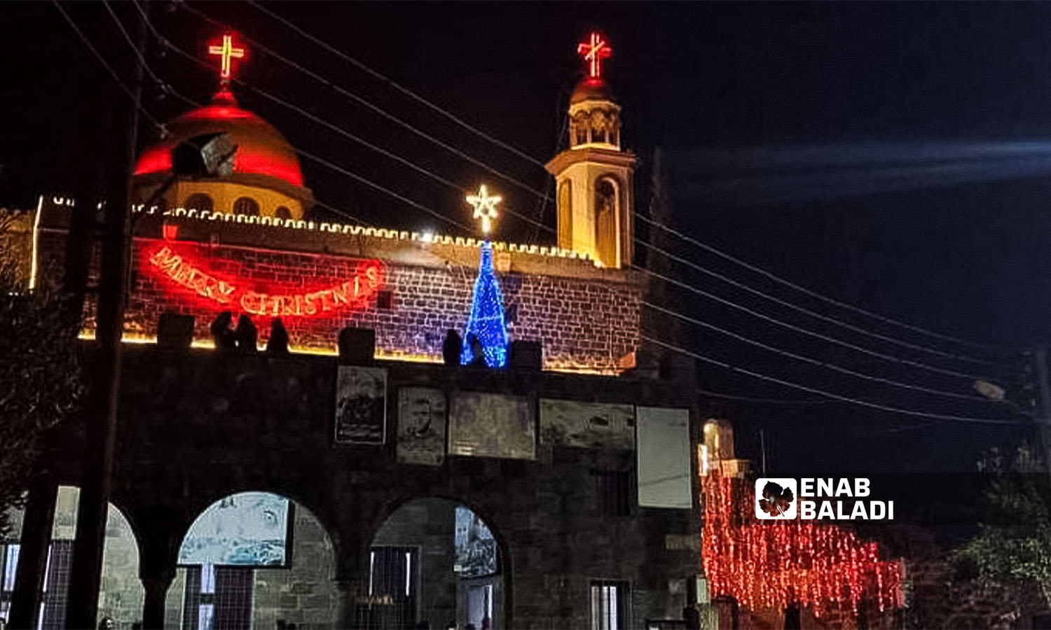 Christmas decorations at the church of the Lady of the Assumption in the town of Khabab, south of Syria - December 16, 2023 (Enab Baladi/Sarah al-Ahmad)
