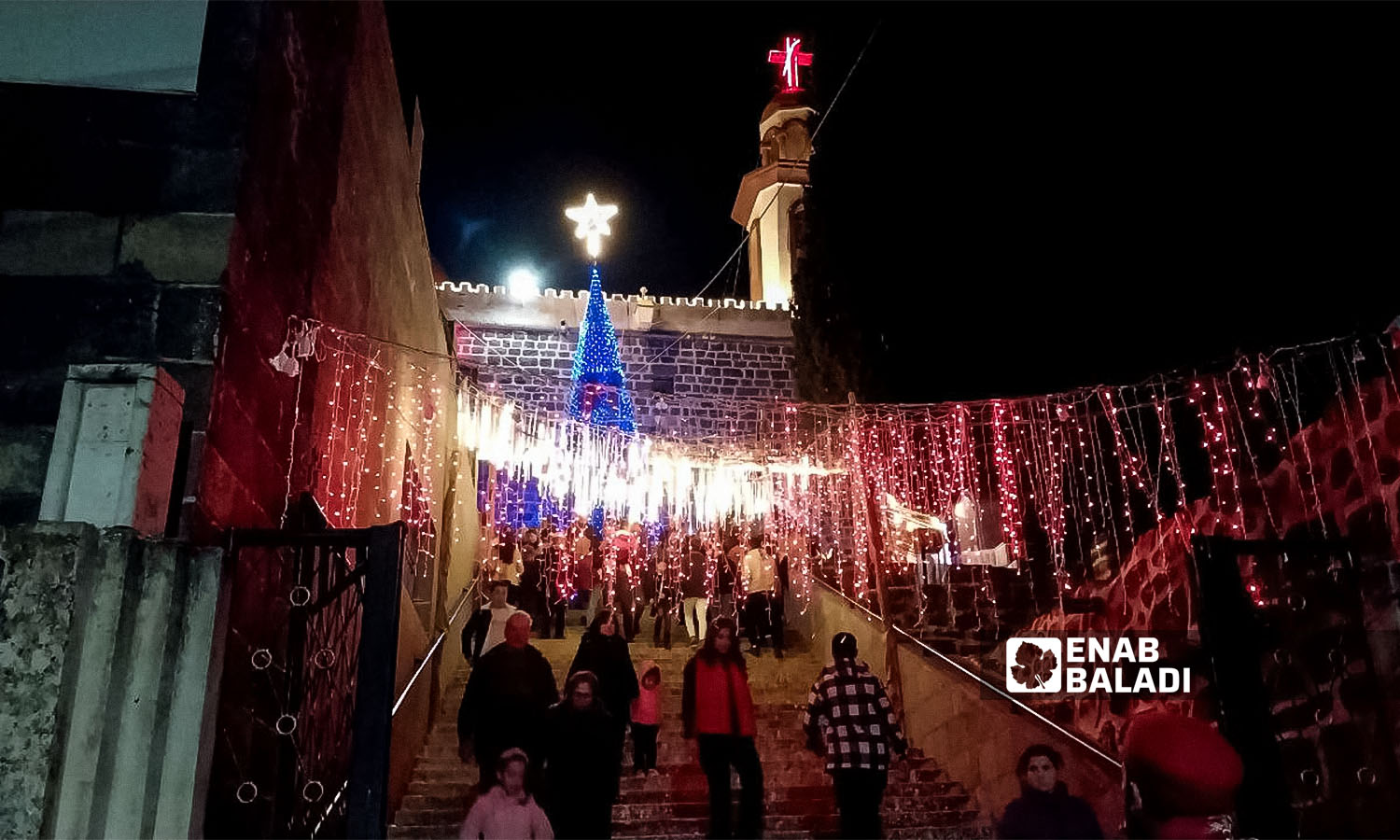 Christmas decorations at the church of the Lady of the Assumption in the town of Khabab, south of Syria - December 16, 2023 (Enab Baladi/Sarah al-Ahmad)
