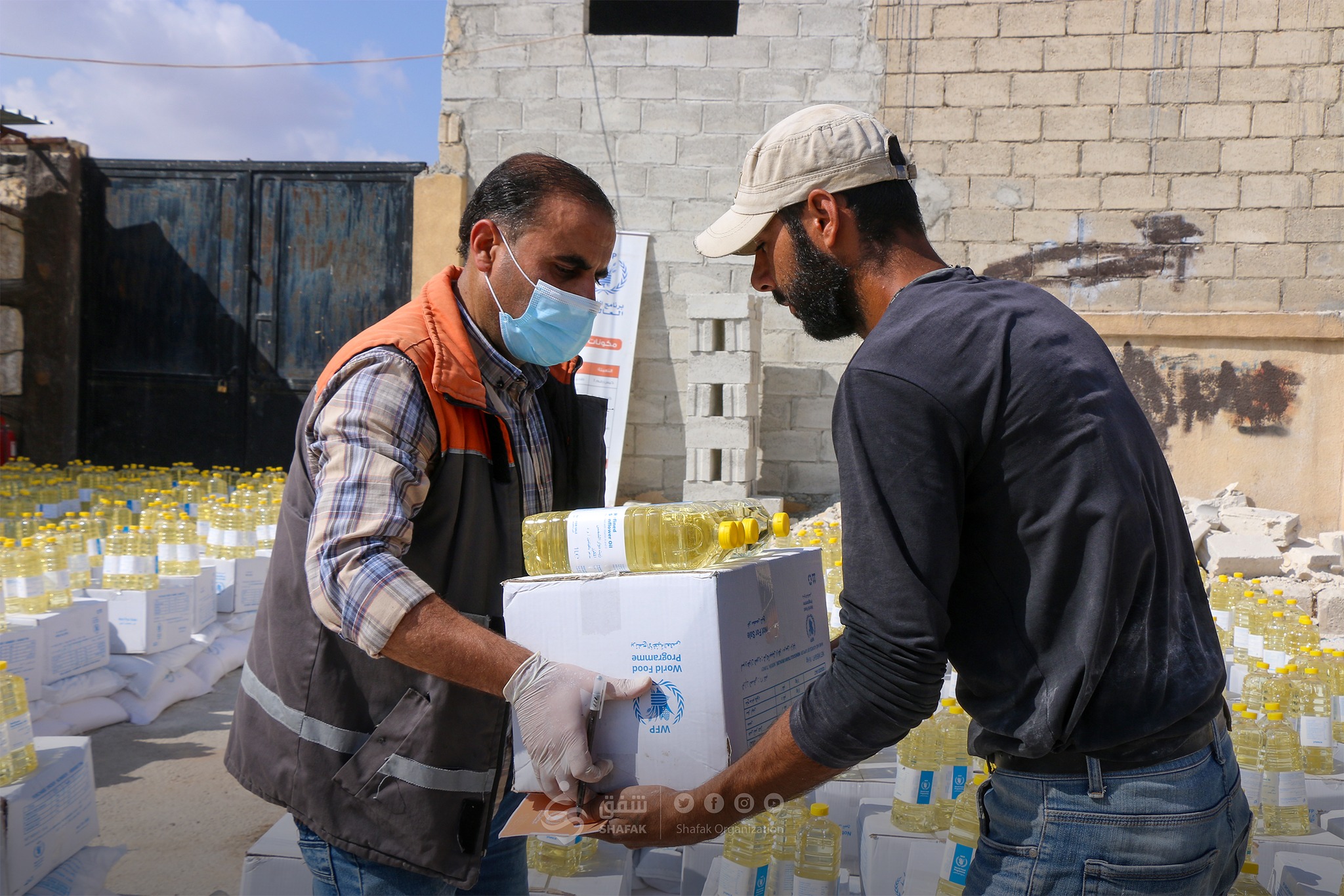 Distribution of food baskets from the World Food Programme (WFP) through the Shafak organization in northern Syria - September 28, 2022 (Shafak)
