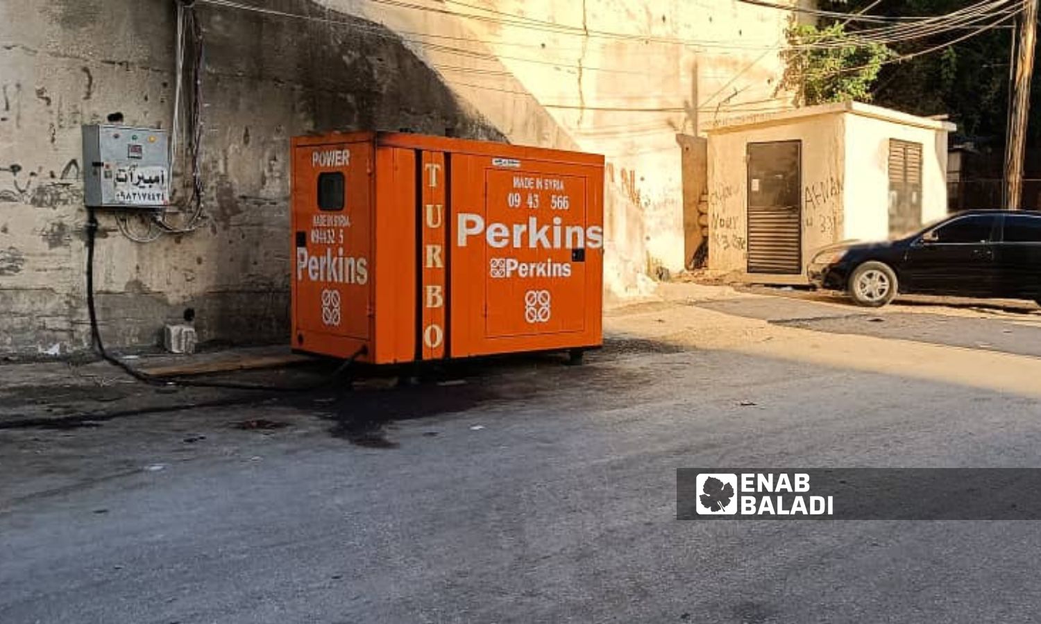 A power generator for ampere subscriptions in al-Qalaa neighborhood (Seventh of April buildings) in the city of Latakia - July 2023 (Enab Baladi)