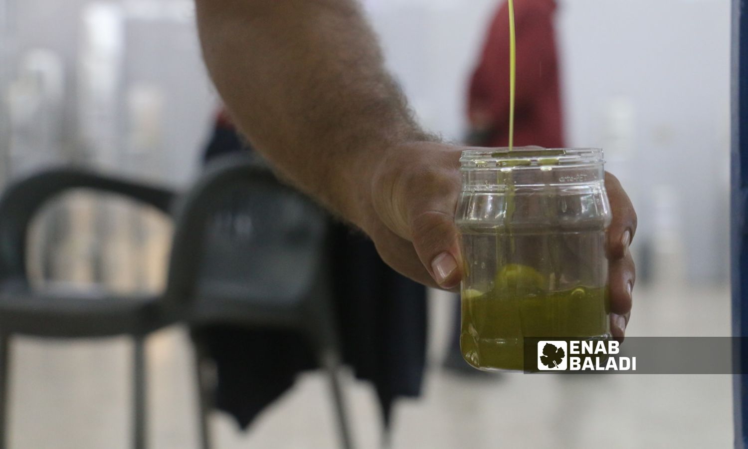 Olive oil inside a press in Aleppo countryside, northern Syria - November 2023 (Enab Baladi/Dayan Junpaz)
