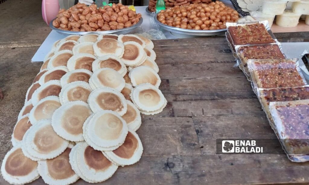 Syrian sweets on display on a stall in Douma city - January 22, 2024 (Enab Baladi/Sarah al-Ahmad)