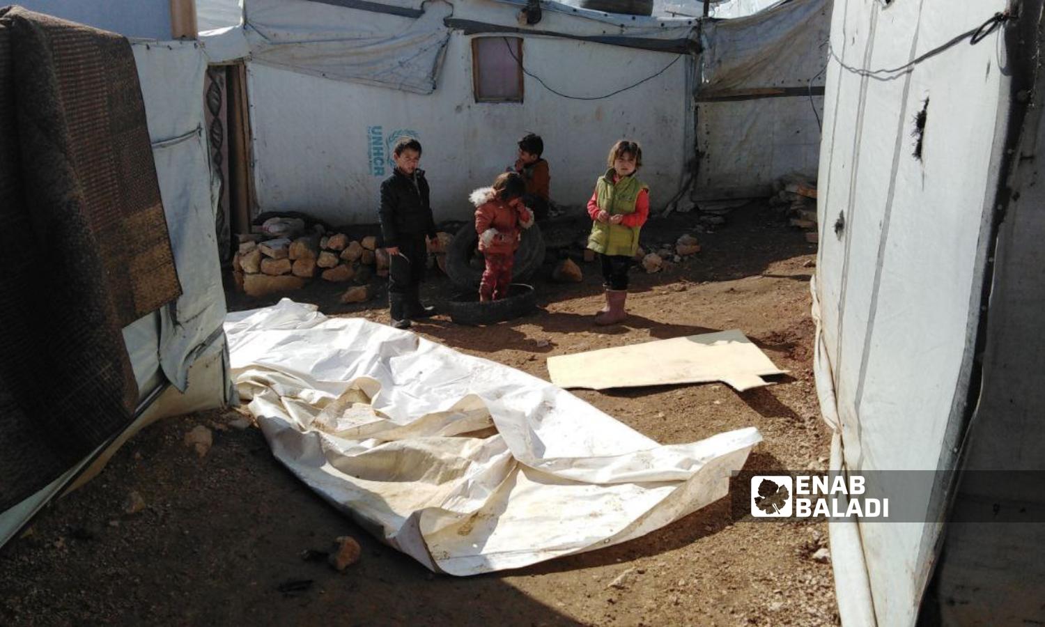 A group of Syrian children play in a camp for Syrian refugees in Arsal city, Lebanon - January 27, 2024 (Enab Baladi)

