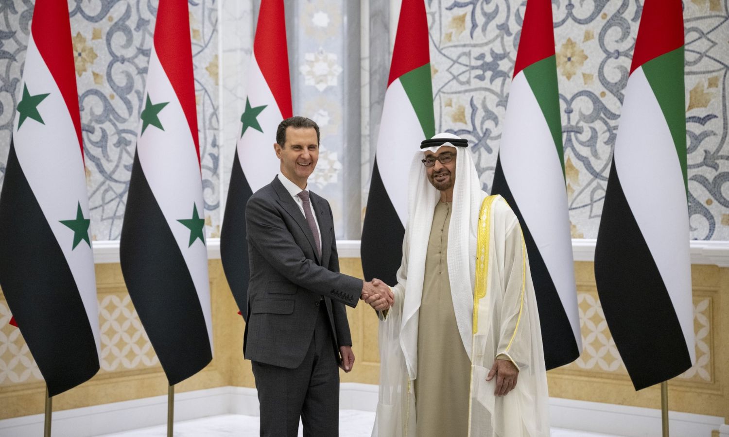 Syrian regime’s President Bashar al-Assad and the Emirati President Mohammed bin Zayed at the Al-Watan Palace in Abu Dhabi - March 19, 2023 (WAM)