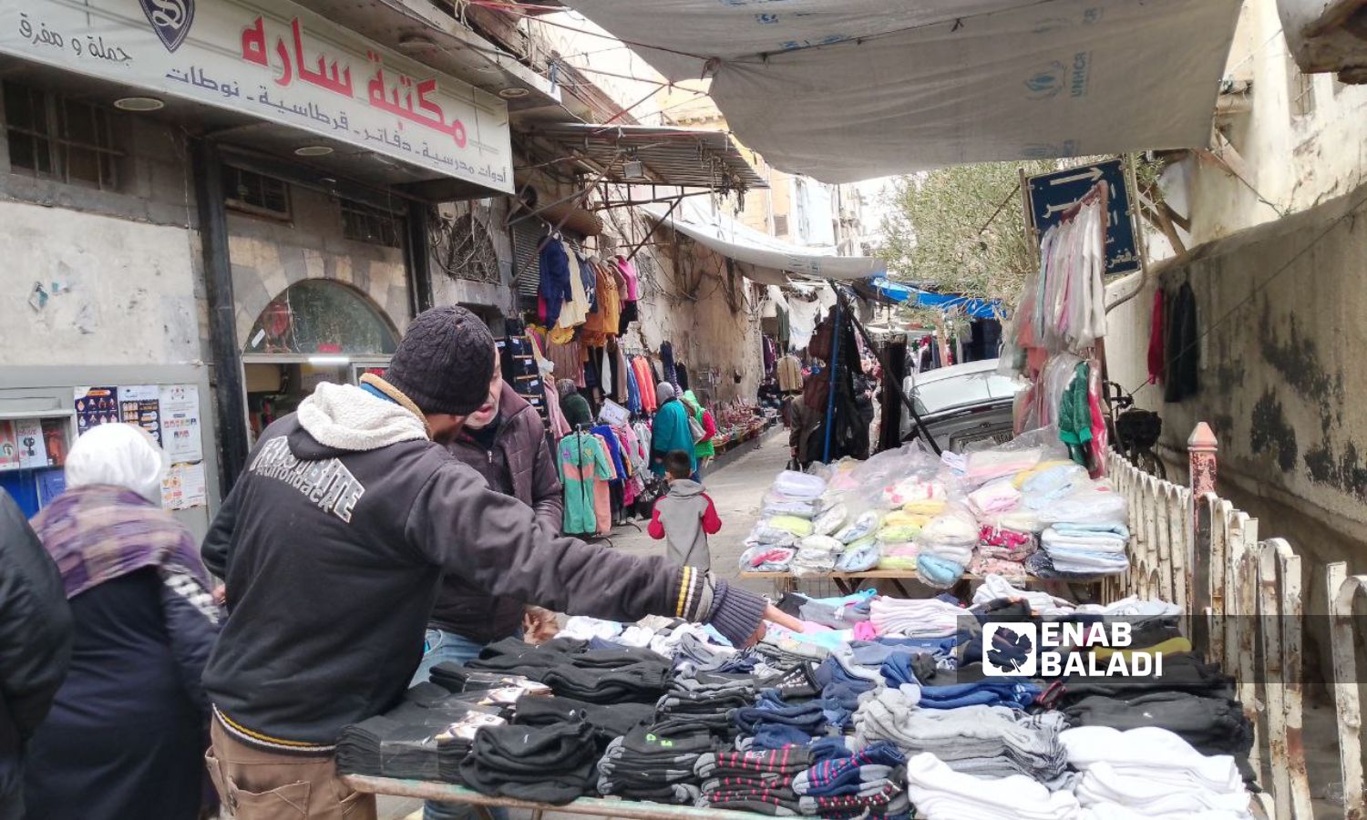 Thrift clothing stores and stalls in Qanawat district of Damascus - February 3, 2024 (Enab Baladi/Sarah al-Ahmad)

