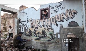 A mural in the city of Binnish in the countryside of Idlib commemorating the one-year anniversary of the Feb. 6 earthquake catastrophe - February 6, 2024 (Enab Baladi/Abdul Karim al-Thalji)