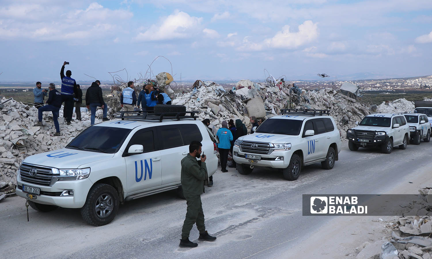 A UN delegation from various agencies during its visit to the earthquake-affected areas in the city of Harem in the countryside of Idlib - February 21, 2023 (Enab Baladi/Mohammad Nasan Dabel)