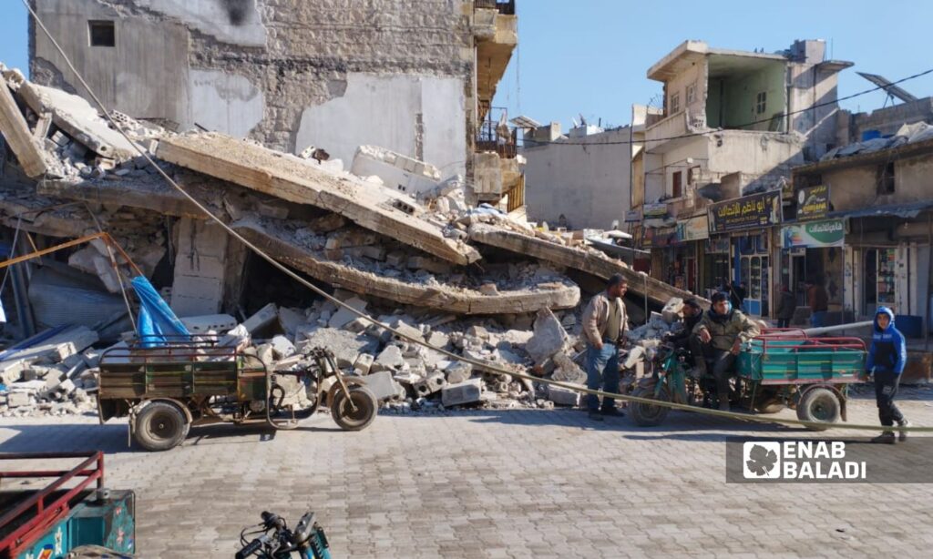 Collapsed buildings in the city of al-Atareb in western Aleppo countryside following an earthquake that struck the northwestern areas of Syria - February 9, 2023 (Enab Baladi)