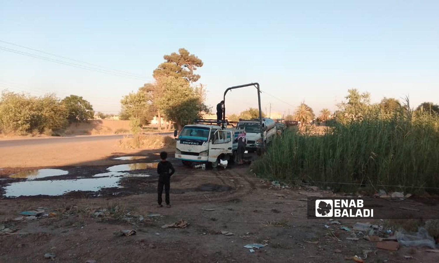 Oil spills inside al-Subha water station east of Deir Ezzor province due to smuggling operations in the area - July 11, 2023 (Enab Baladi/Obadah al-Sheikh)