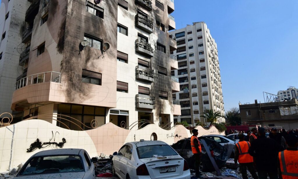 A building targeted by Israeli aircraft in the Kafr Sousa neighborhood in the Syrian capital, Damascus - February 21, 2024 (SANA)