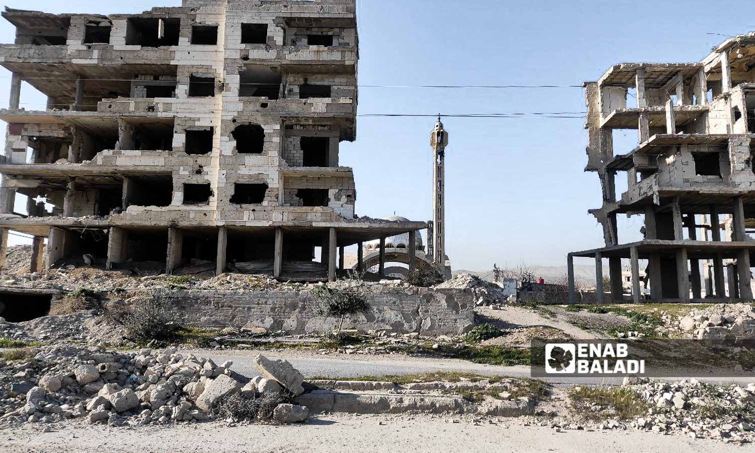 Destroyed buildings near the Mosque of Aqeel bin Abi Talib in Harasta city in the Damascus countryside - March 5, 2024 (Enab Baladi/Sarah al-Ahmad)
