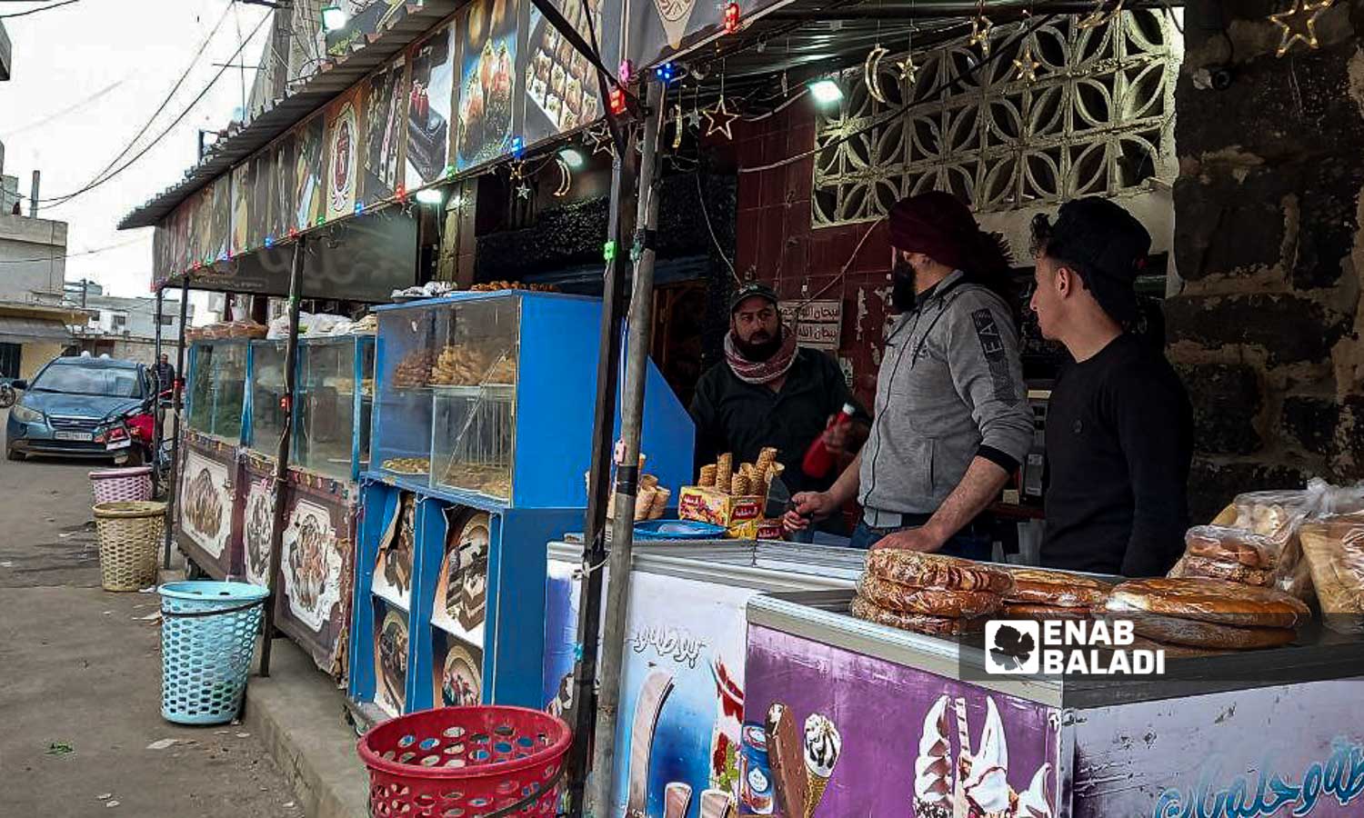 Sweets seller during the month of Ramadan in the city of Tafas in the western countryside of Daraa - March 17, 2024 (Enab Baladi/Halim Muhammad)