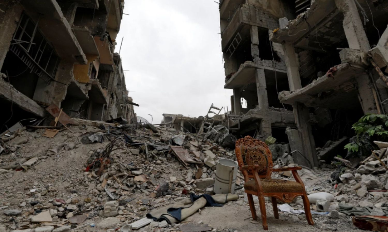 Destruction in al-Hajar al-Aswad, south of the Syrian capital Damascus - May 22, 2018 (Reuters)