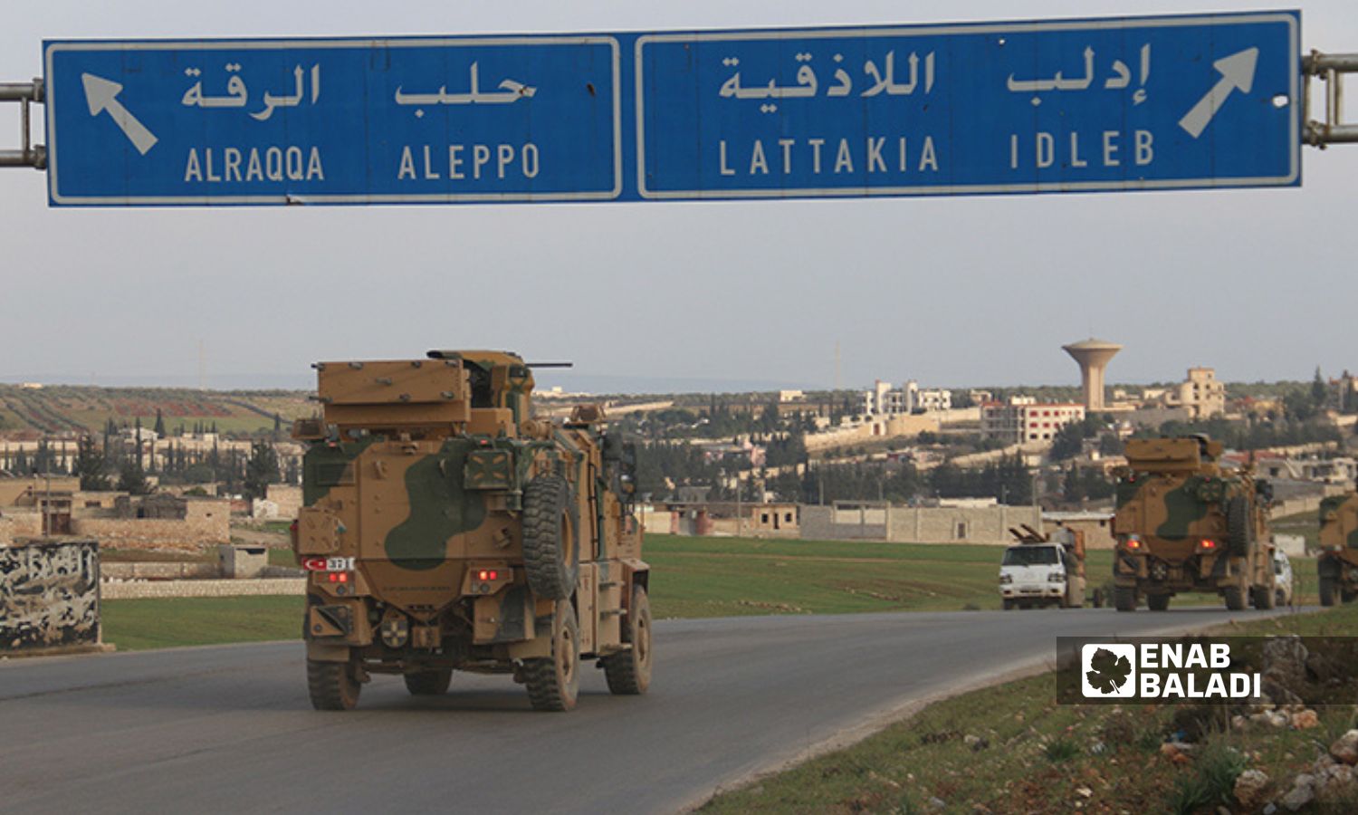 A convoy of 25 Turkish military vehicles enters Syrian territory in the city of al-Atarib - February 3, 2020 (Enab Baladi)