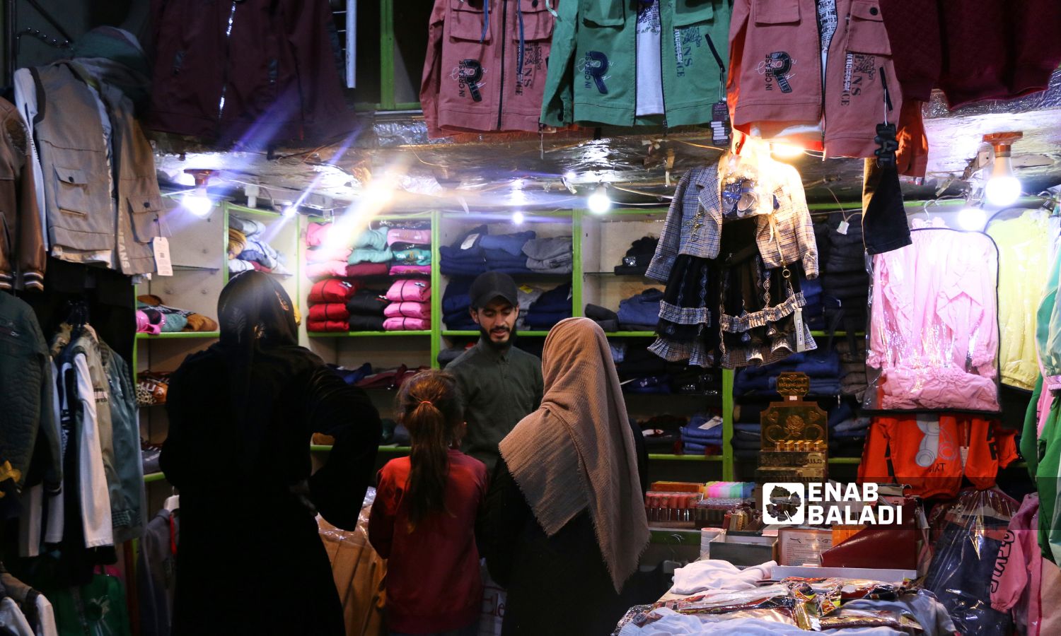 Weak turnout for clothing purchases in Ras al-Ain before Eid al-Fitr due to the high prices - April 2, 2024 (Enab Baladi)