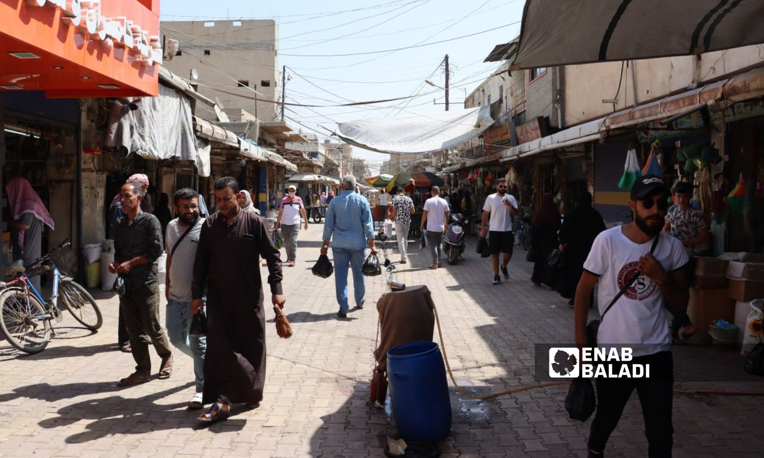 A market in the city of Qamishli in northern al-Hasakah - July 11, 2023 (Enab Baladi/Rita Ahmad)