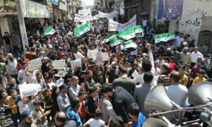 Demonstrators in the city of Binnish, east of Idlib province, demand the fall of the leader of Hayat Tahrir al-Sham, Abu Mohammad al-Jolani - April 19, 2024 (Mohammed Haj Kadour/Facebook)