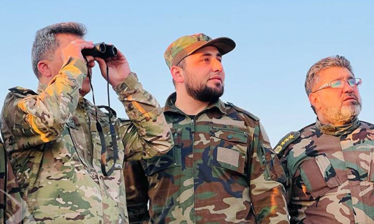 A leader in the Syrian National Army (right), Al-Mutasim Abbas (center), the commander of the al-Mutasim Division in the Syrian National Army, and the defense minister of the Syrian Interim Government, Hassan al-Hammada (left) - April 16, 2022 (Hayat Thaeroon for Liberation)