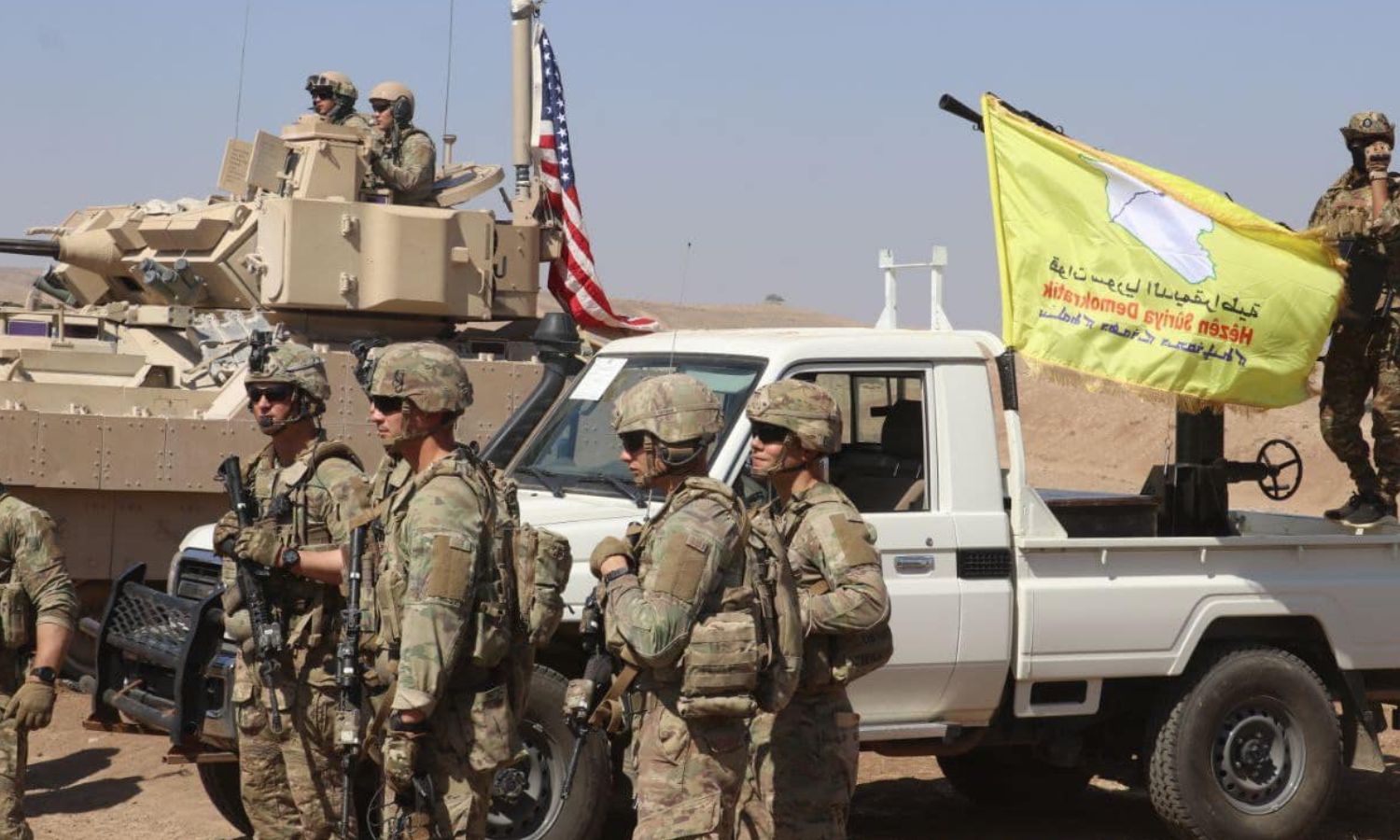 Fighters from the Syrian Democratic Forces (SDF) alongside soldiers from the US army during military training in northeast Syria - September 7, 2023 (Syrian Democratic Forces/Facebook)