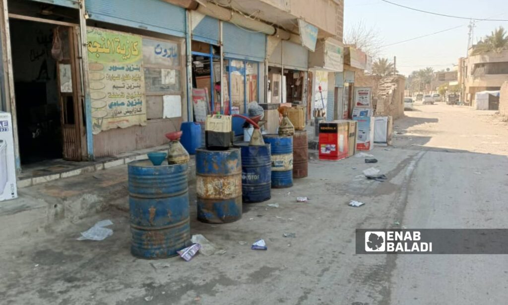 A stall selling fuel in the city of al-Basira in the eastern countryside of Deir Ezzor - May 6, 2024 (Enab Baladi/Obadah al-Sheikh)