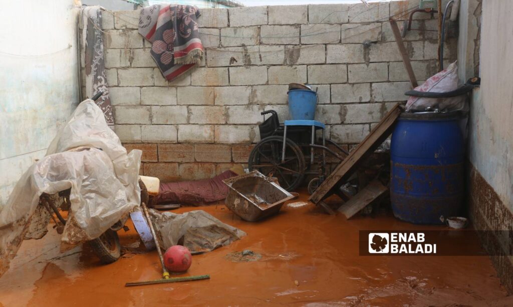 Rainwater leaked into the tents of displaced people at the Sham Maryam camp on the outskirts of Maarat Misrin city due to a rainstorm - May 2, 2024 (Enab Baladi/Iyad Abdul Jawad)