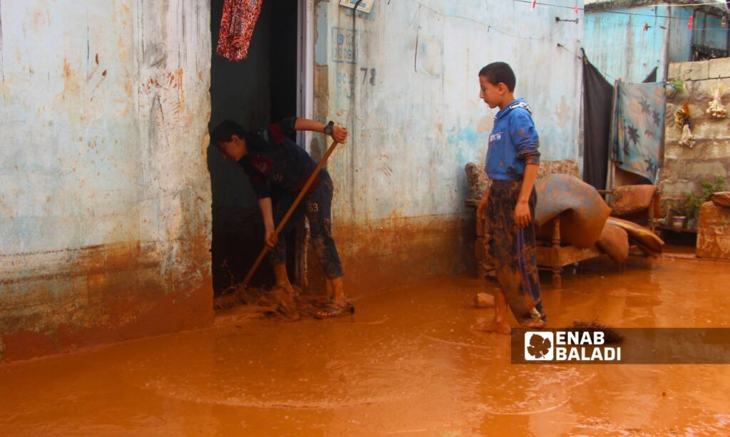 Rainwater leaked into the tents of displaced people at the Sham Maryam camp on the outskirts of Maarat Misrin city due to a rainstorm - May 2, 2024 (Enab Baladi/Iyad Abdul Jawad)