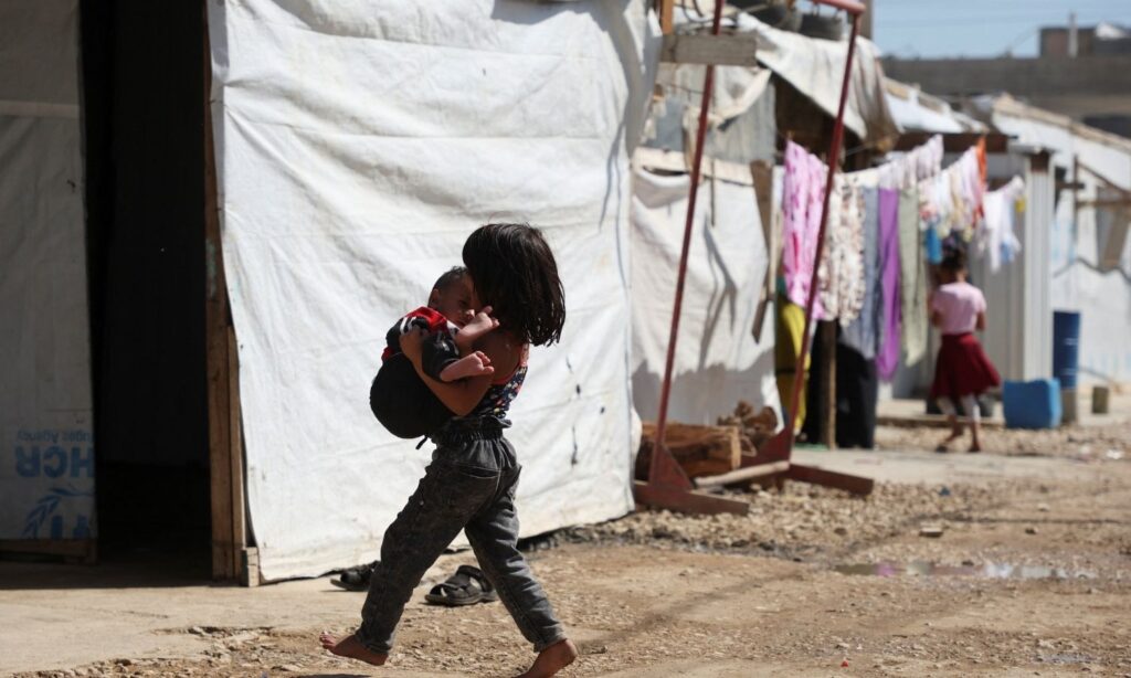 A Syrian refugee girl in an informal camp in the Bekaa Valley, Lebanon - November 12, 2022 (Reuters)