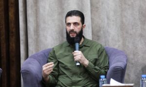 The leader of Hayat Tahrir al-Sham, which holds military control in Idlib, Abu Mohammad al-Jolani, during his meeting with dignitaries and religious men from Idlib - May 15, 2024 (Ministry of Information in the Salvation Government)