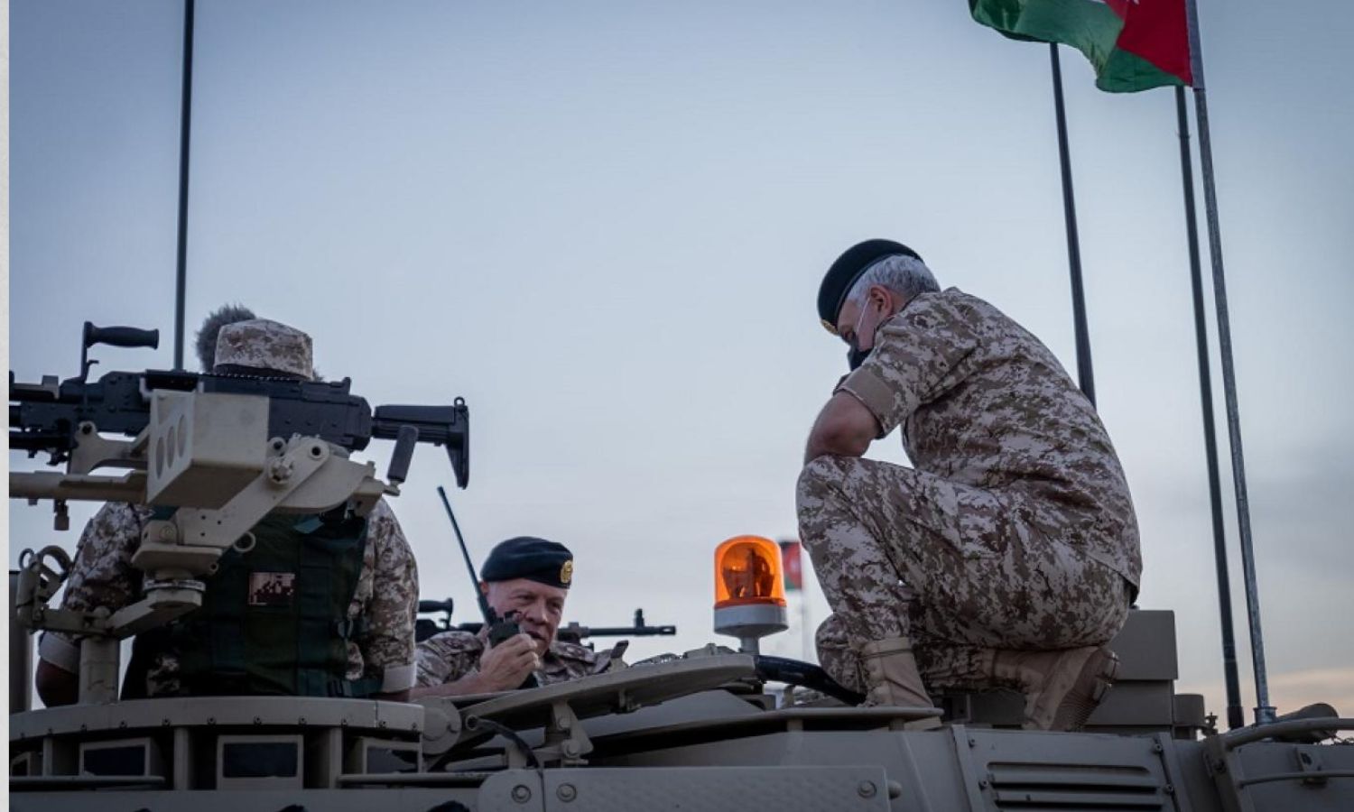 King Abdullah II of Jordan mounts a Jordanian military armored vehicle during exercises (Jordanian Armed Forces)