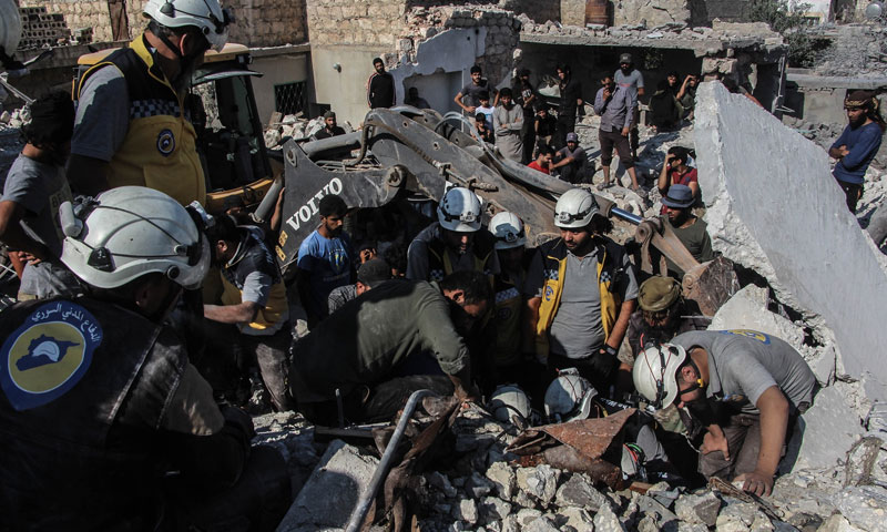 The Syria Civil Defence during the rescue of civilians subjected to aerial bombardment by Russian aircraft in Khan Sheikhoun, south of Idlib - July 13, 2019 (Syria Civil Defence)