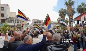 A demonstration demanding the fall of the Syrian regime in al-Karama Square in the center of As-Suwayda, southern Syria - May 3, 2024 (Enab Baladi)