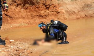 The Water Rescue Teams in the Syria Civil Defence retrieved the body of a child who drowned in a deep water oasis around farmlands on the outskirts of Isqat village in western Idlib countryside - May 8, 2024 (Syria Civil Defence)