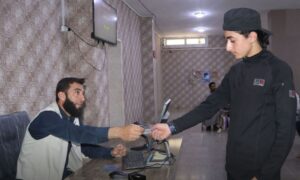 Issuing personal IDs from a center in the city of Sarmada in Idlib - July 7, 2023 (Sham News Agency)