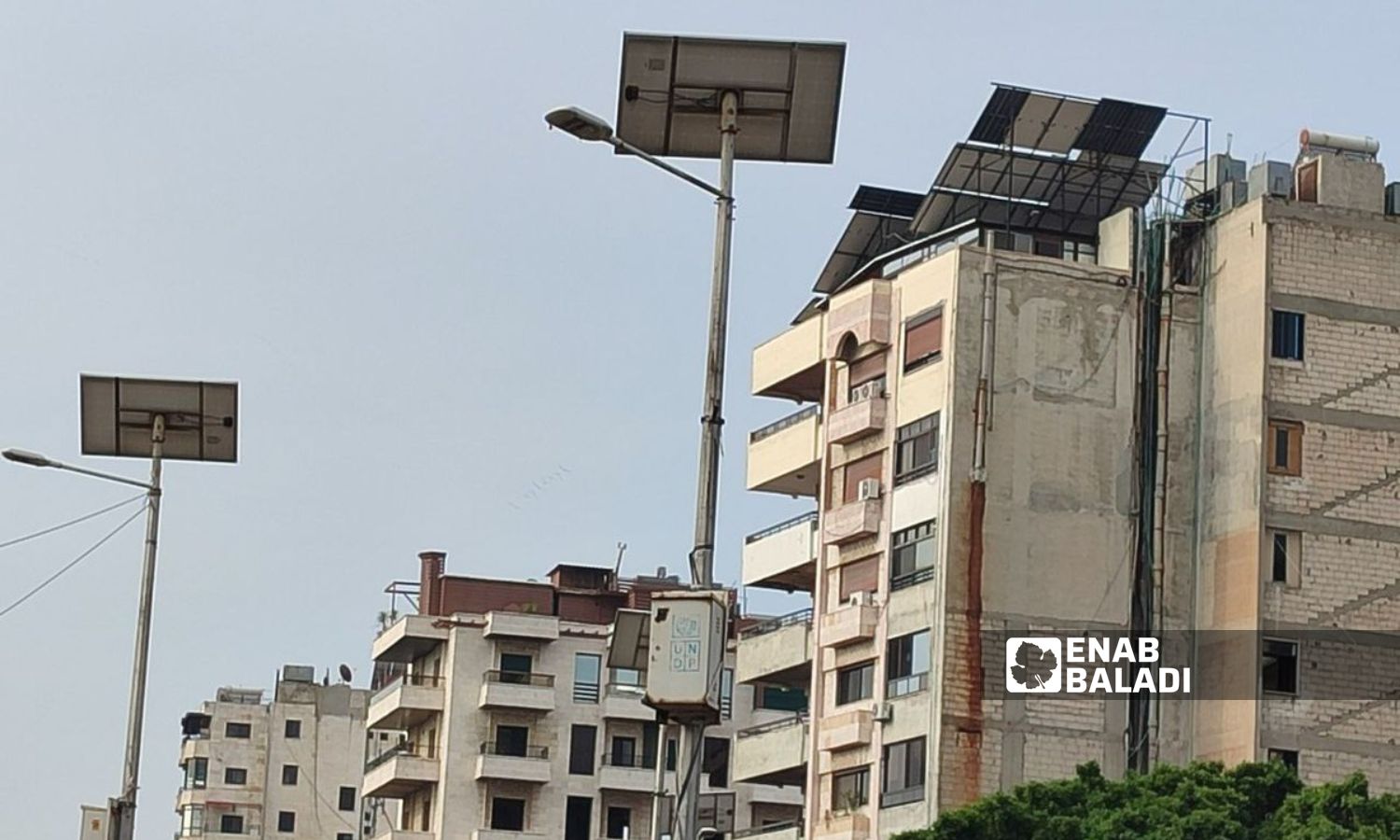 Solar panels on buildings in Latakia city - May 19, 2024 (Enab Baladi/Linda Ali)
