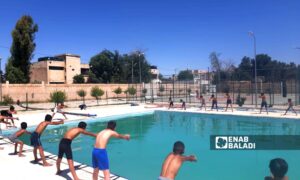 Young people and children in Ras al-Ain are keen to learn swimming skills - June 21, 2024 (Enab Baladi)