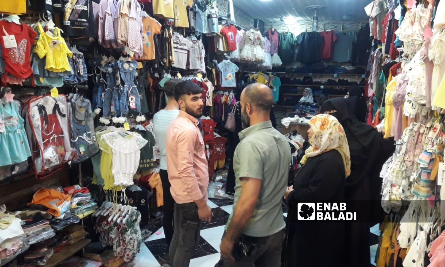 Low turnout at clothing stores before Eid al-Adha in Idlib city – June 24, 2023 (Enab Baladi/Anas al-Khouli)