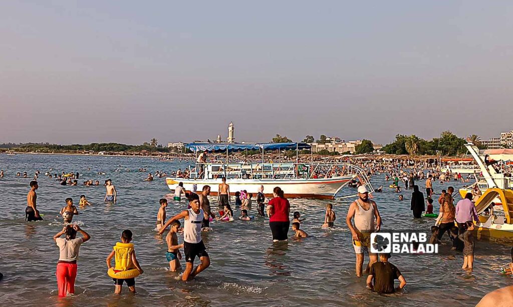 The Karnak Beach is a popular tourism site in the Blue Beach area in Latakia - July 23, 2024 (Enab Baladi/Linda Ali)