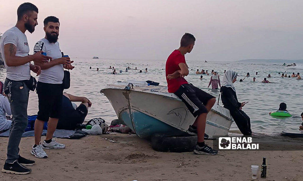 The Karnak Beach is a popular tourism site in the Blue Beach area in Latakia - July 23, 2024 (Enab Baladi/Linda Ali)