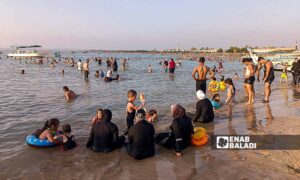 Residents flock to the beaches to escape the summer heat in Latakia - July 23, 2024 (Enab Baladi/Linda Ali)