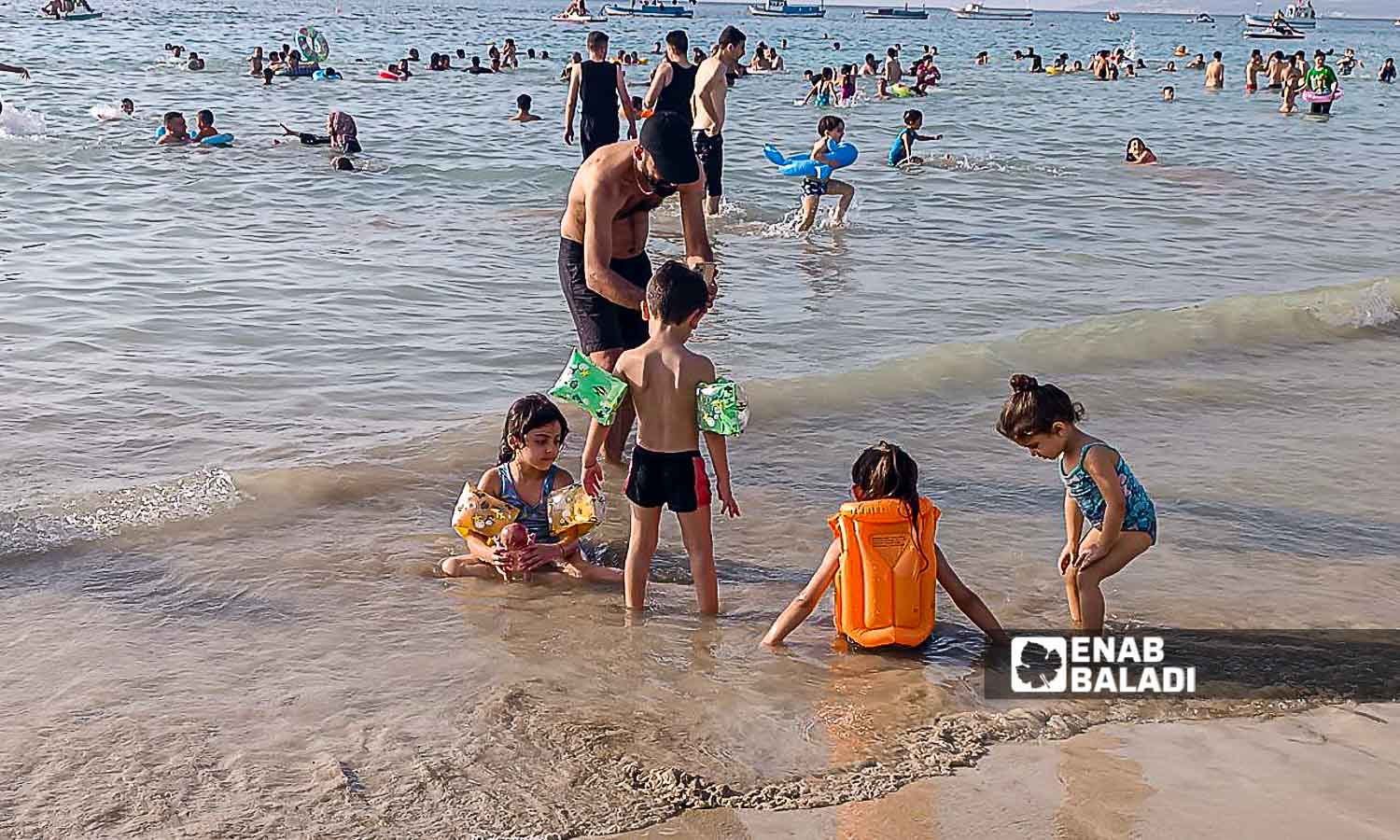 The Karnak Beach is a popular tourism site in the Blue Beach area in Latakia - July 23, 2024 (Enab Baladi/Linda Ali)
