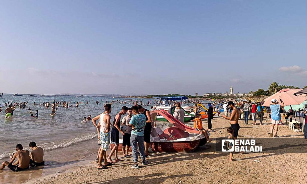 The Karnak Beach is a popular tourism site in the Blue Beach area in Latakia - July 23, 2024 (Enab Baladi/Linda Ali)