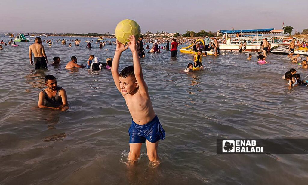 The Karnak Beach is a popular tourism site in the Blue Beach area in Latakia - July 23, 2024 (Enab Baladi/Linda Ali)