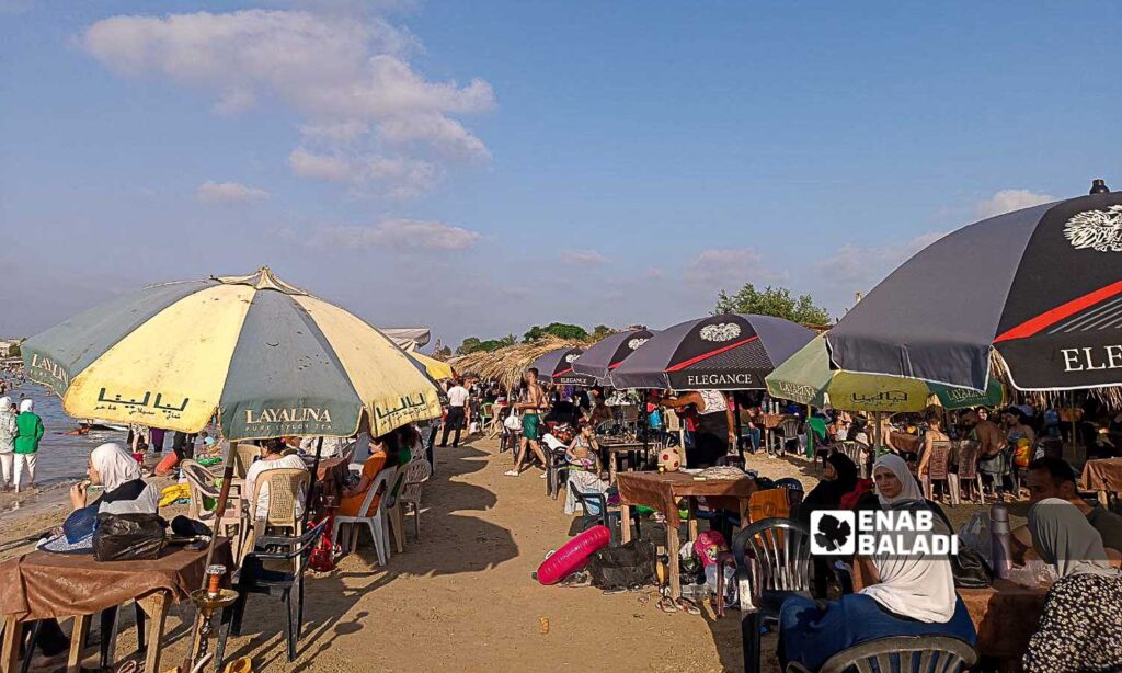 The Karnak Beach is a popular tourism site in the Blue Beach area in Latakia - July 23, 2024 (Enab Baladi/Linda Ali)