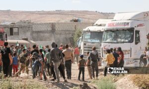 Protesters prevent Turkish vehicles from entering northern Syria at Bab al-Salameh crossing - July 1, 2024 (Enab Baladi/Dayan Junpaz)