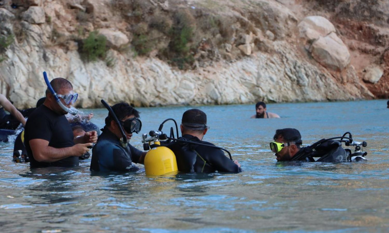 Members of the Syria Civil Defence during rescue operations for drowning victims in water bodies in northwestern Syria - July 26, 2024 (Syria Civil Defence/Telegram)