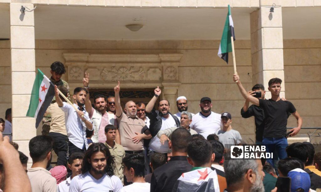 Protesters inside the opposition’s Syrian National Coalition building in Azaz, northern Aleppo - July 12, 2024 (Enab Baladi/Dayan Junpaz)