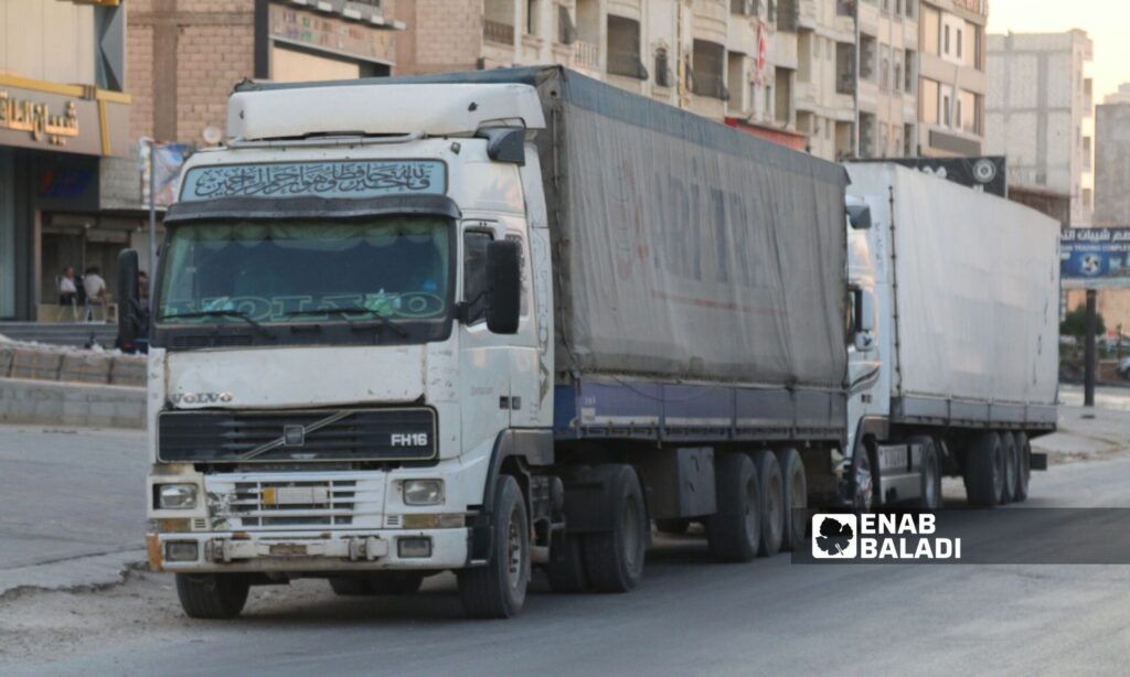 Freight trucks loaded with goods in the city of Azaz in northern Aleppo countryside - July 13, 2024 (Enab Baladi/Dayan Junpaz)